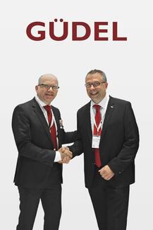 Martin Sträb, CEO Güdel Group, und Bernd Peter Schmidt, der Leiter des Geschäftsbereiches Trafoanlagen bei Georg, versprechen sich viel von der zukünftigen Zusammenarbeit.